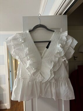 fab'rik White Pleated V-Neck Peplum Top